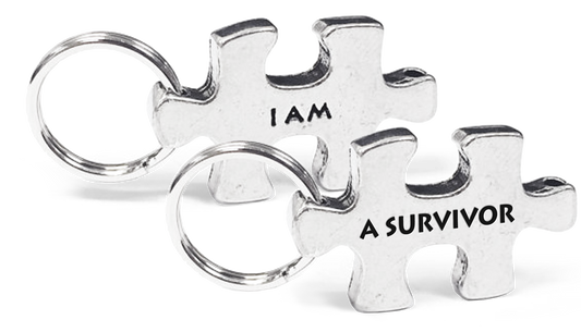 A Survivor Puzzle Piece Token on Key Loop